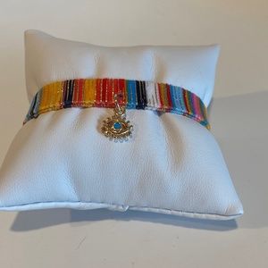 Women’s adjustable bracelet with evil eye